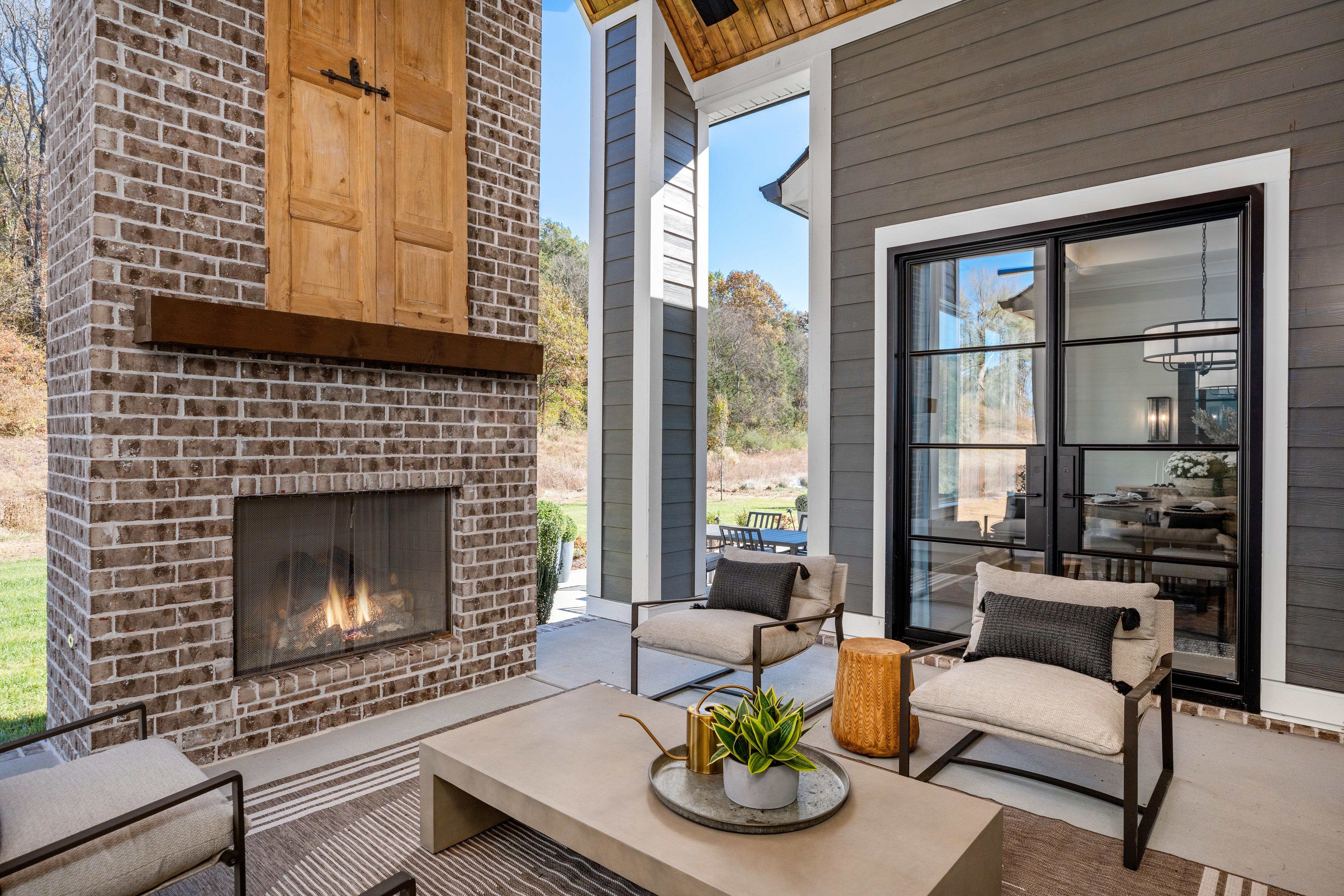 outdoor living area with fireplace