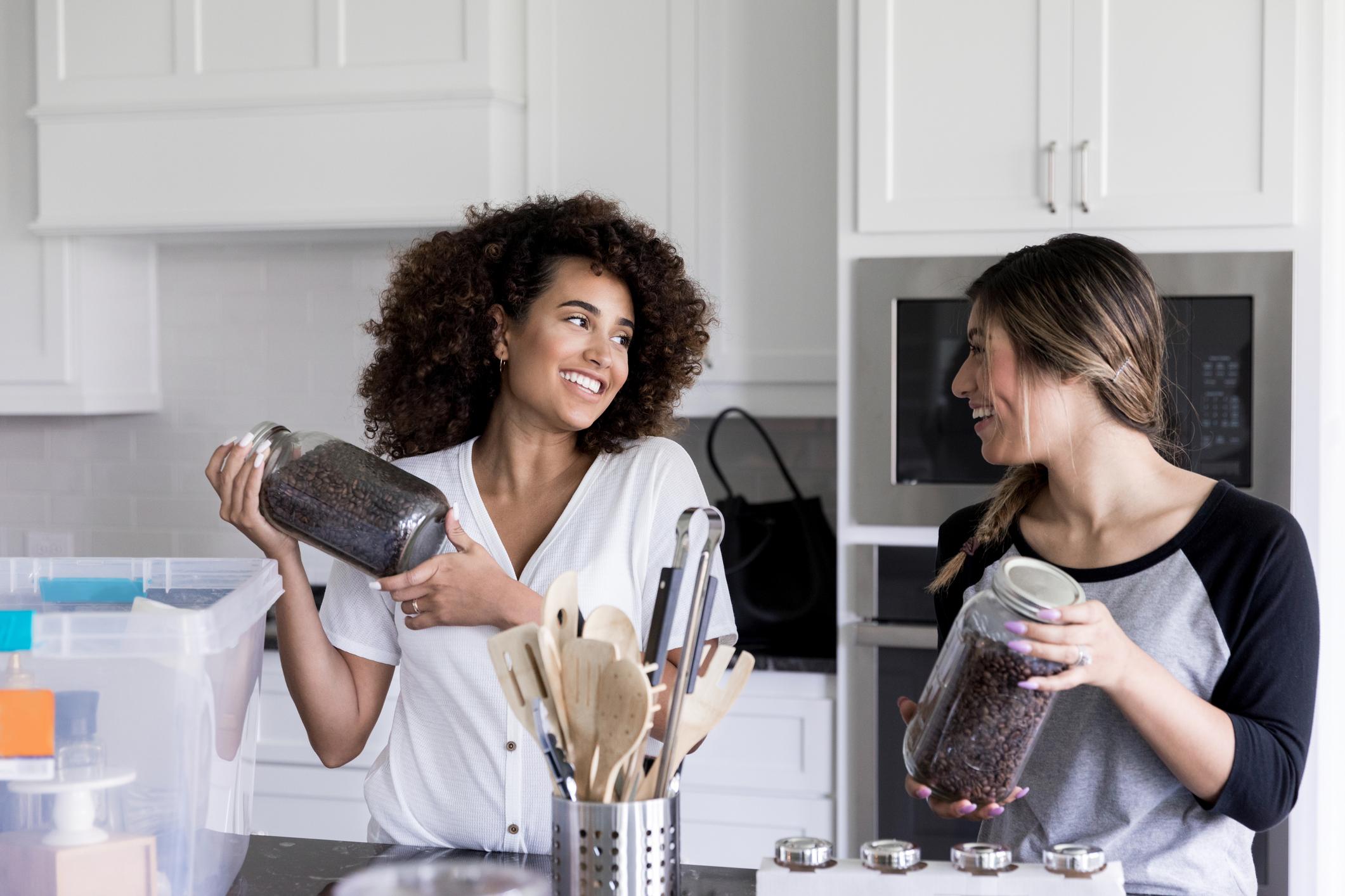 Friends in home kitchen