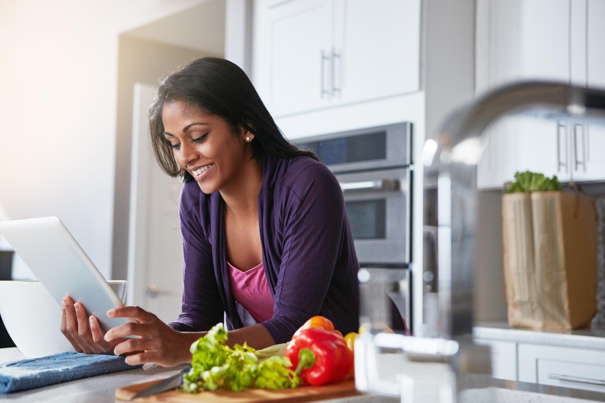 Woman cooking in home kitchen