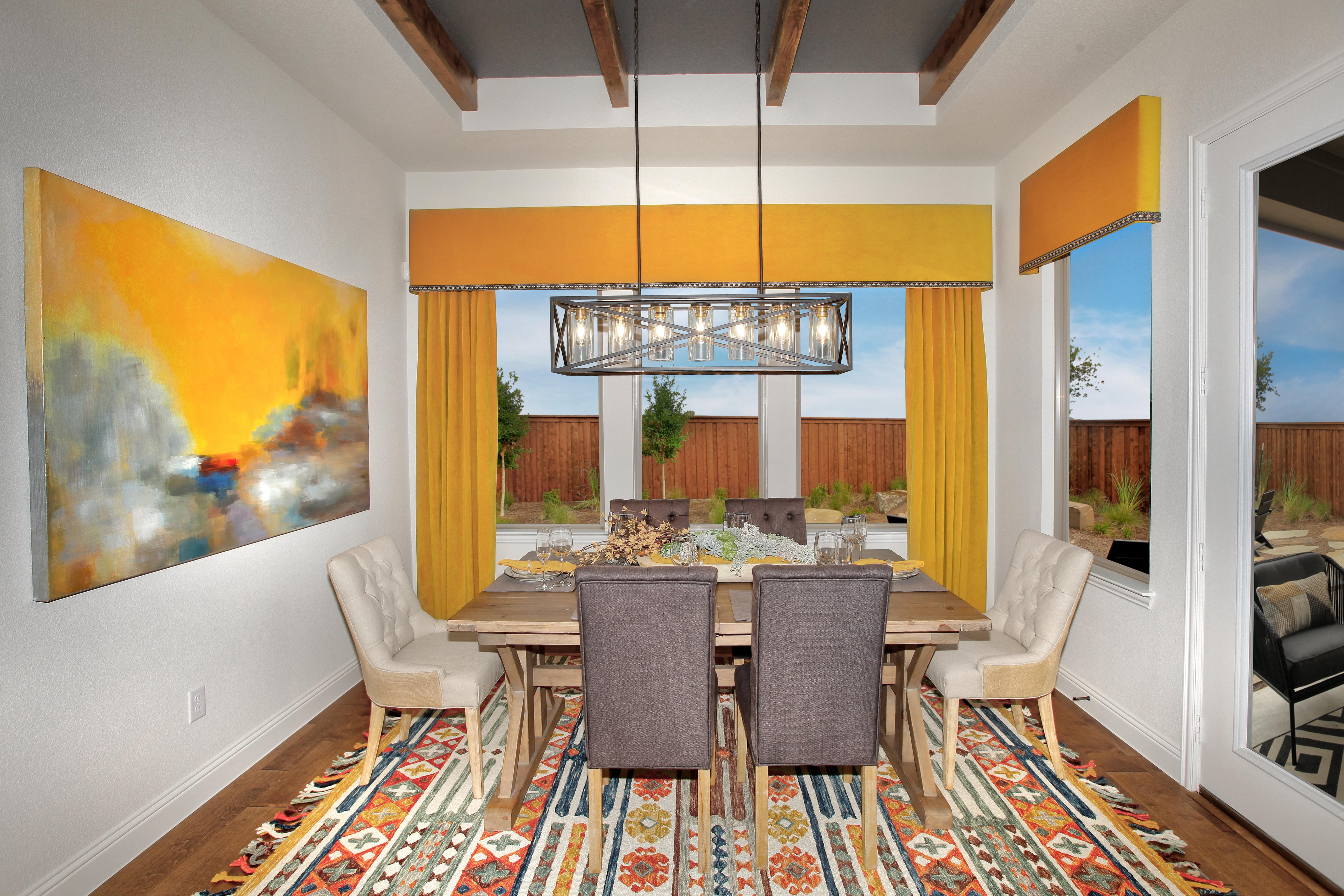 Dining room with yellow accents