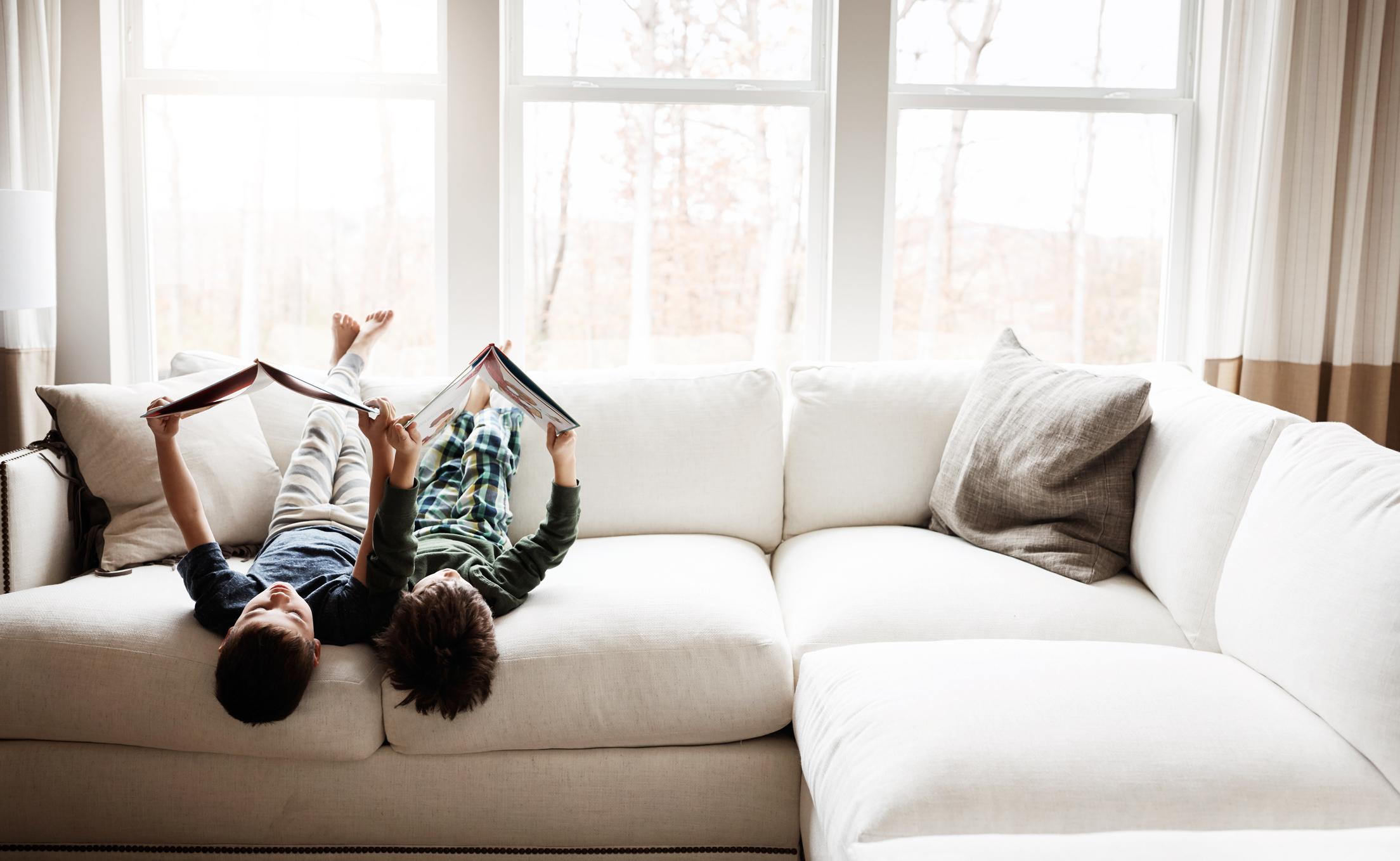 Kids reading books at home