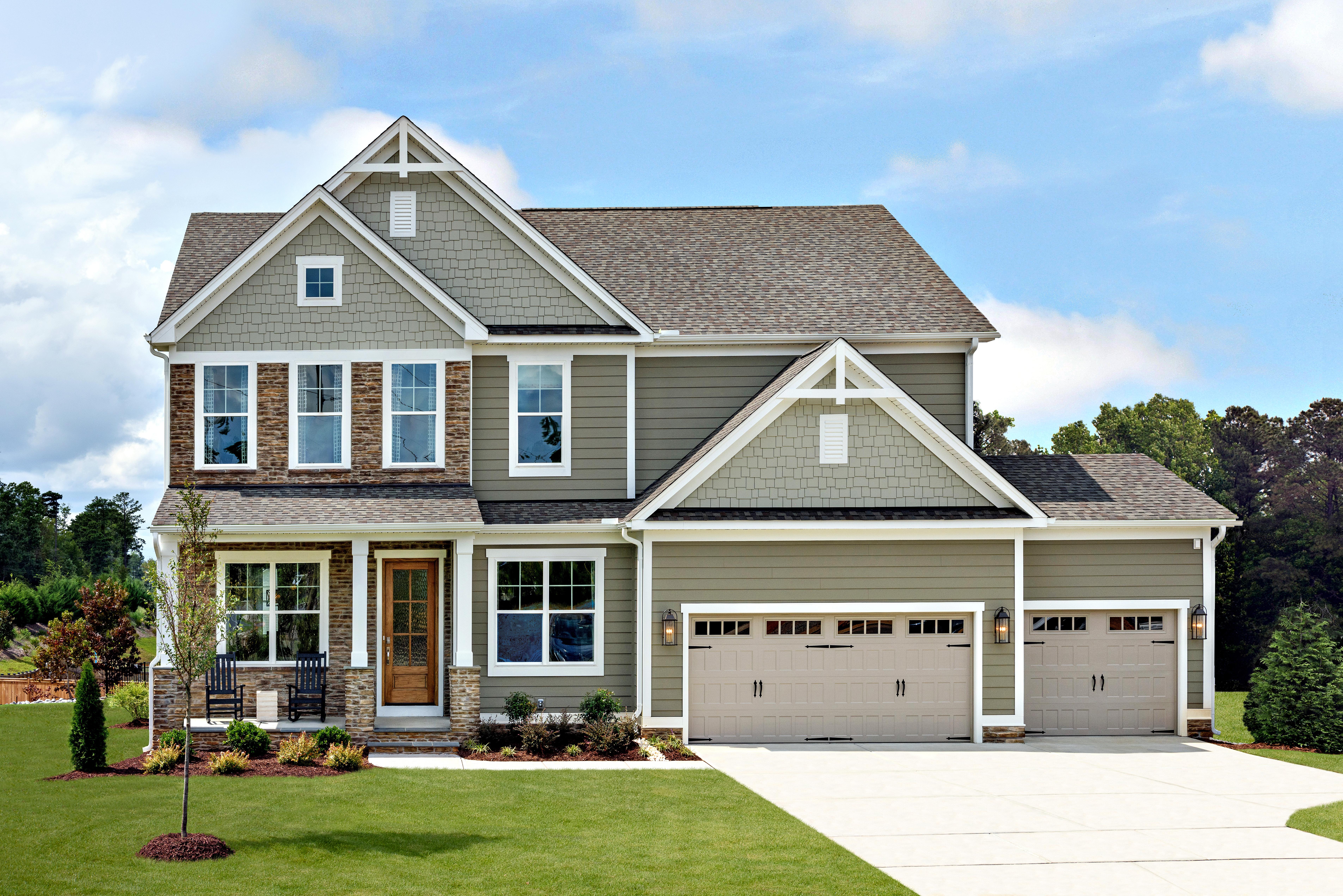 two-story home with three-car garage