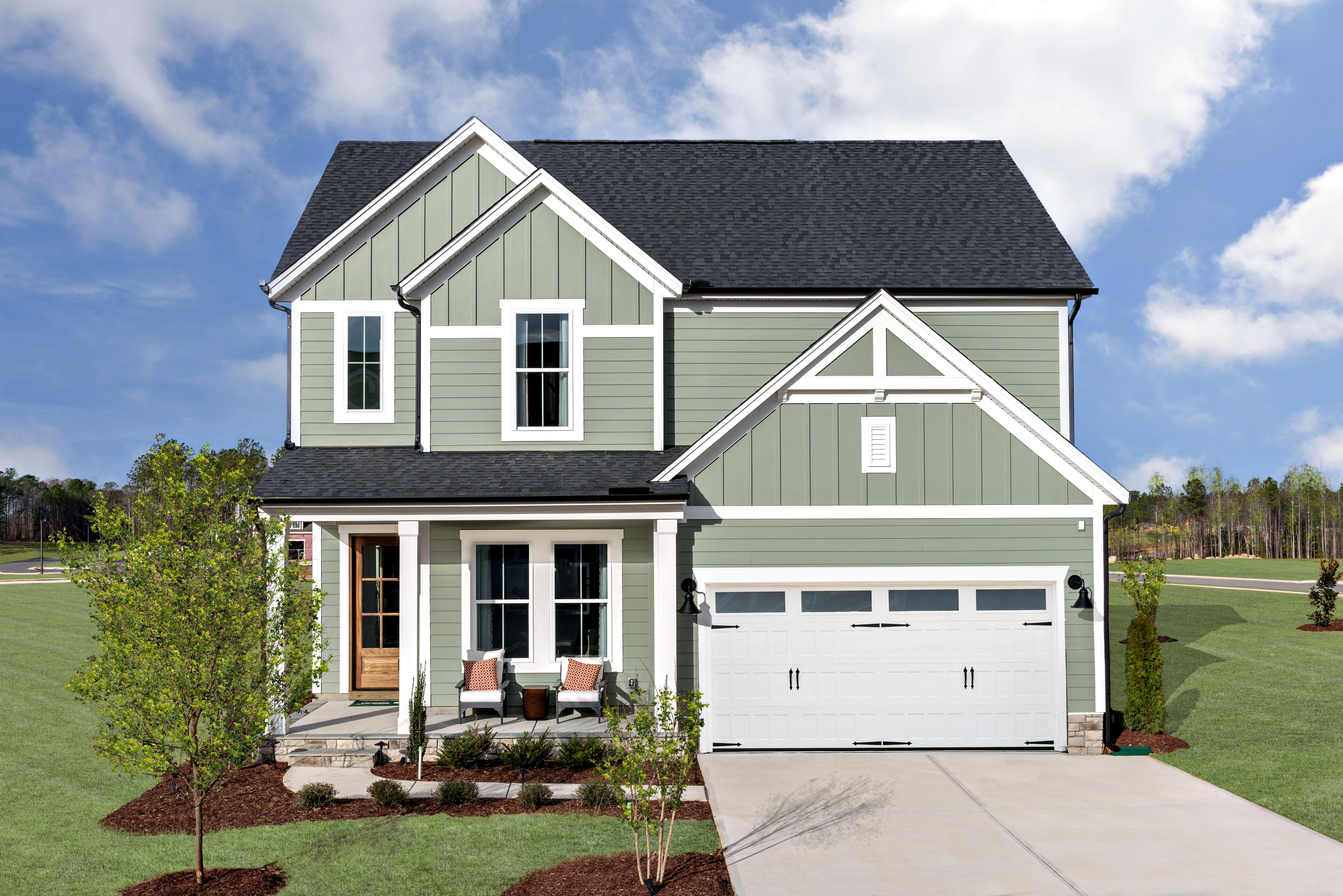 custom home with green exterior