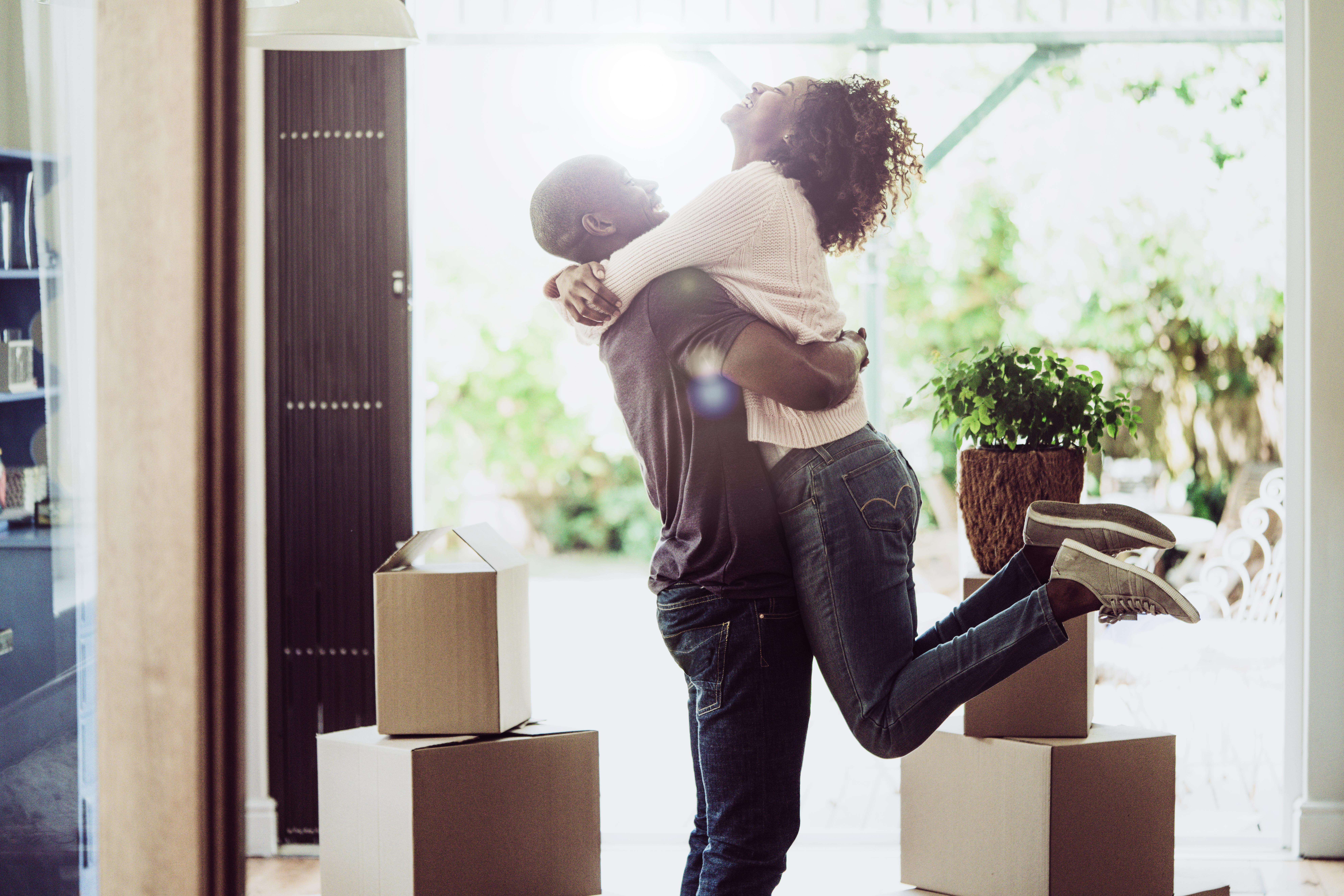 Happy couple in new home