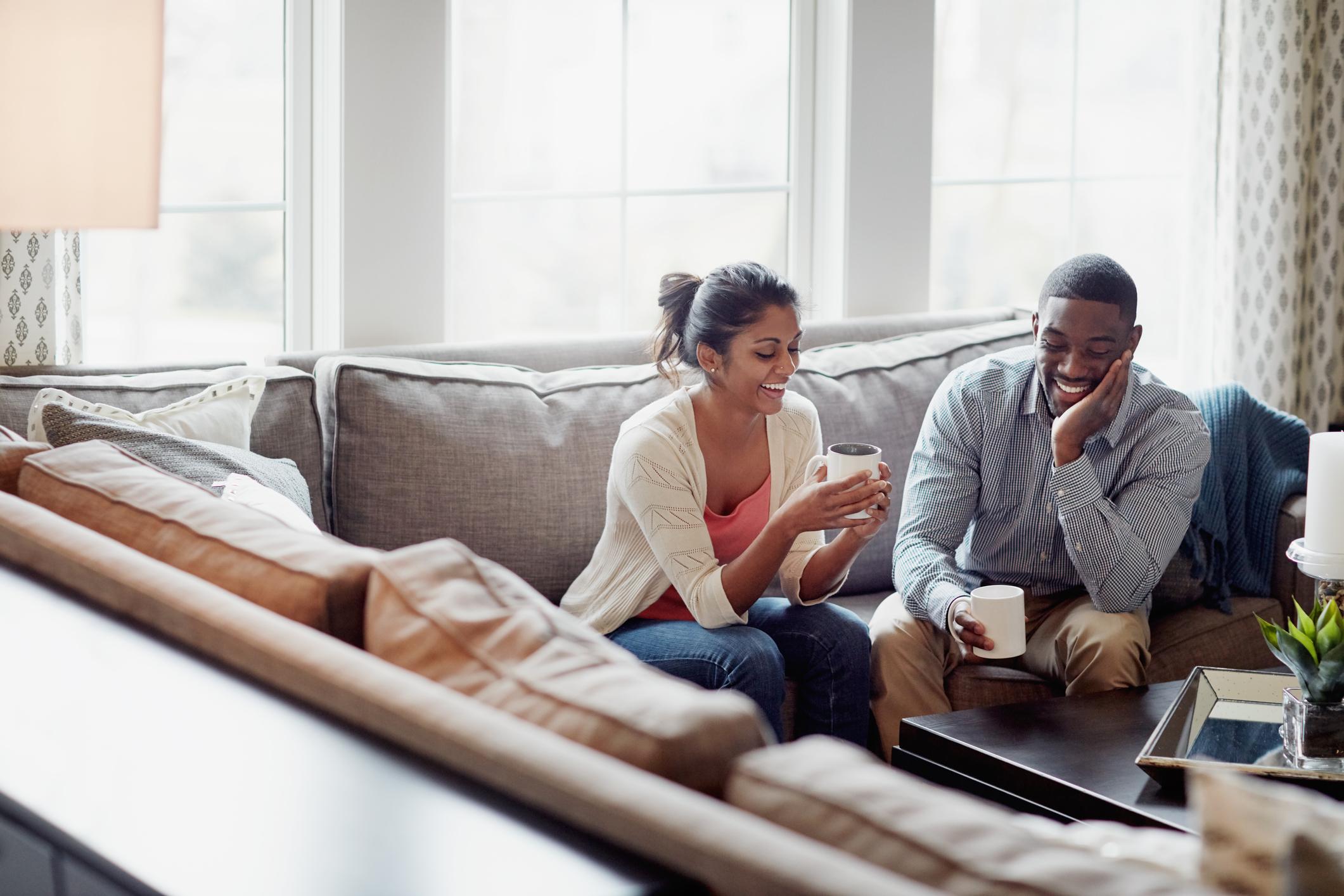 Couple drinking coffee at home